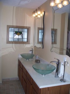 Stained glass, new countertop, lights, mirrors and vessel sinks and faucets